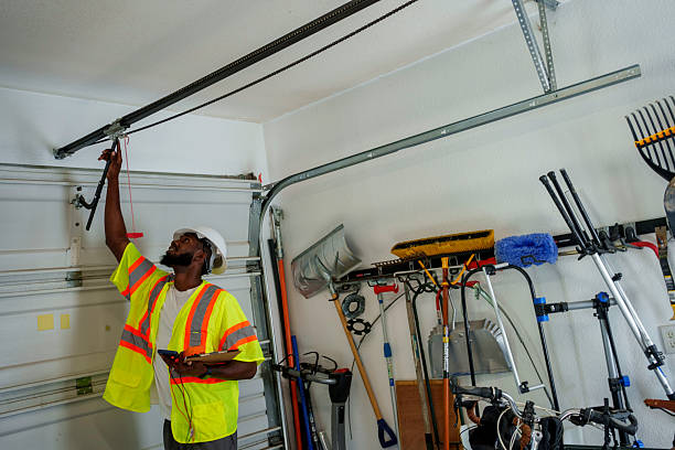 Professional Garage Door Roller Replacement technician working in Columbia City, OR